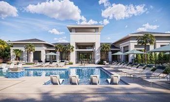 Resort style pool with tanning ledge, sundeck & cabanas